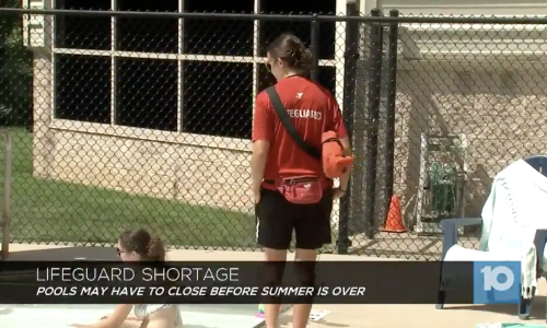 Lifeguard watching over pool