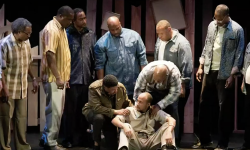 Y-Haven residents performing play on stage