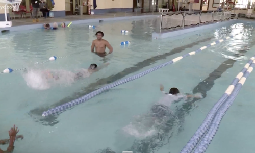 Kids taking swim lessons at the Lakewood Family YMCA