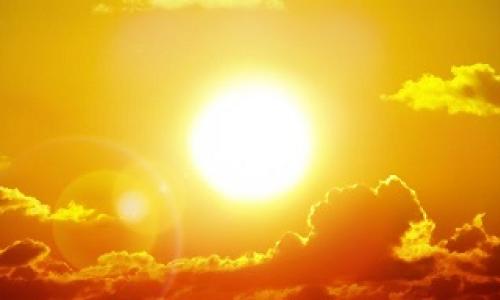 Orange and yellow sunrise above the clouds