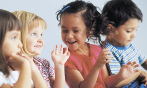 Preschool age children laughing