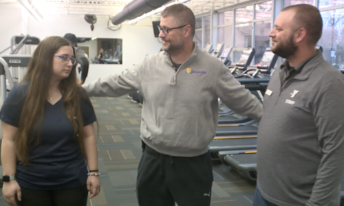 Chuck Conrad (center) shared his extreme gratitude with YMCA lifeguards Jim Mannion and Abby Williams for providing life-saving assistance