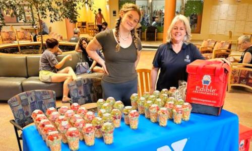 YMCA staff members offer food to citizens without power
