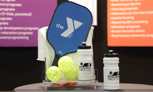 YMCA Pickleball paddle and water bottle