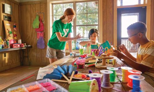 Campers and camp staff create arts and crafts