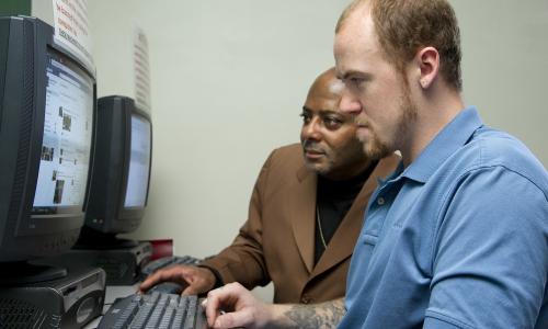 Y-Haven member attending a computer class