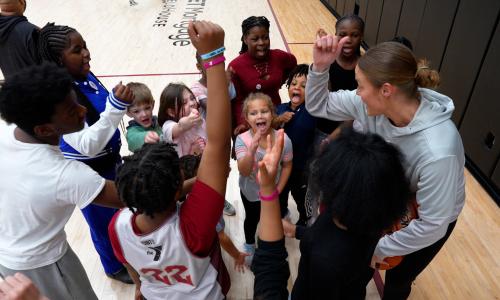 Jr. Cavs team cheering at Rocket Arena Training Room