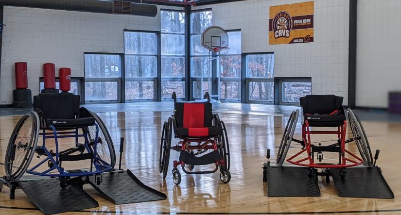 3 wheelchairs on court showing adaptive equipment at the ymca